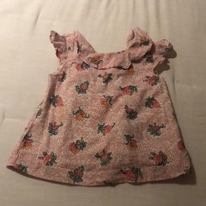 Pink and white floral blouse